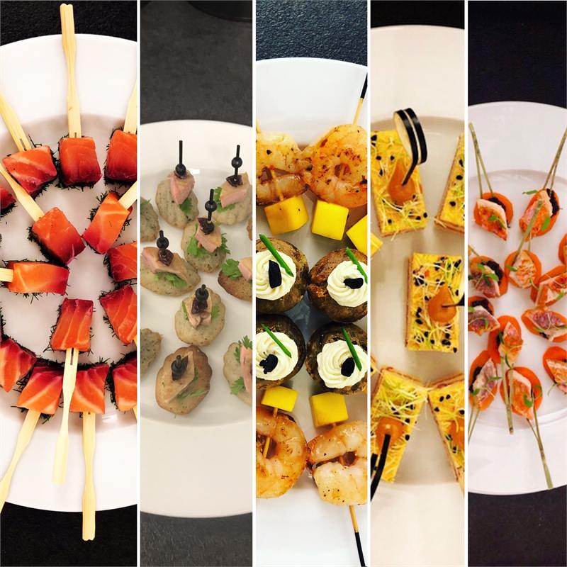 Assortiment de pièces cocktail colorées en brochettes et bouchées